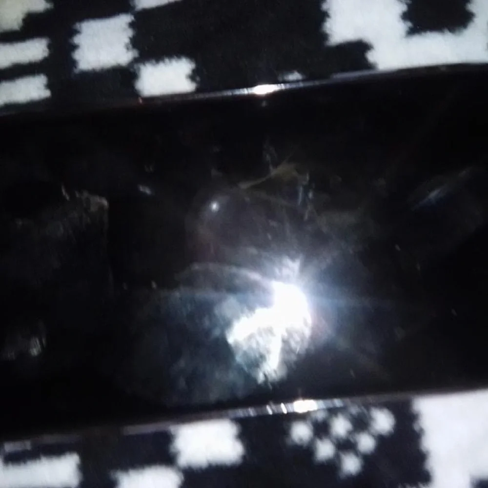 Apple iPhone with Black and Silver MagSafe